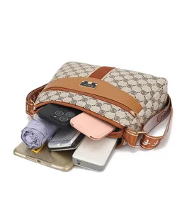 Detailed view of large capacity women crossbody shoulder bag showing spacious interior storage.
