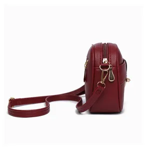 Wine red minimalist crossbody bag for women, trendy solid color stylish shoulder bag.