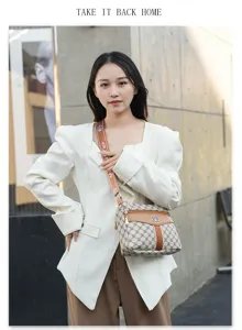 Stylish women crossbody bag with large capacity, trendy monogram pattern and wide strap.