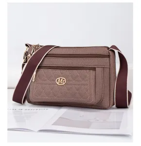 Sac bandoulière en toile grande capacité style coréen avec multiples poches zippées femme