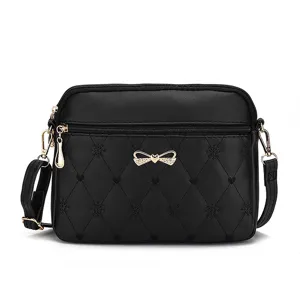 Black quilted crossbody shoulder bag for women with cute bow and embroidery details for daily use.
