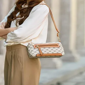 Vintage monogram baguette shoulder bag for women, chic retro crossbody daily handbag.