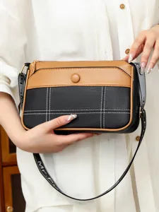 Stylish women's crossbody shoulder bag, chic two-tone design with large capacity for daily use.