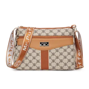 Stylish crossbody bag for women, retro patterned shoulder bag with wide strap and multi-pocket.