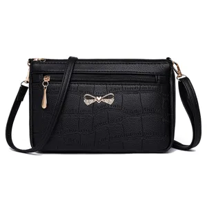 Borsa a tracolla nera effetto coccodrillo da donna, elegante borsa con zip multiple.