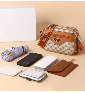 Stylish women's crossbody shoulder bag with patterned strap, perfect for daily casual use.