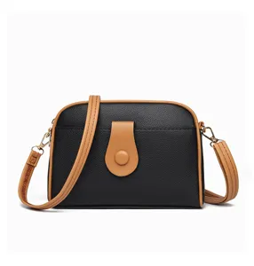 Chic black camel dome crossbody bag for women, stylish contrast trim shoulder bag.