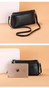 Classic black PU leather crossbody shoulder bag for women with multi-pocket design and size view.