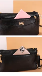 Women casual black PU leather shoulder cross body bag detail view showing zipper and pocket.