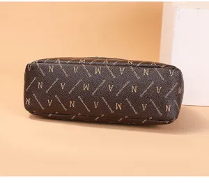 Detail view of brown vintage monogram printed women crossbody bag showcasing texture.