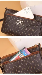 Retro monogram women crossbody bag with multi-layer zipper and chic metal buckle design.