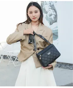 Sac à bandoulière matelassé noir pour femme avec sangle large grande capacité élégant sac