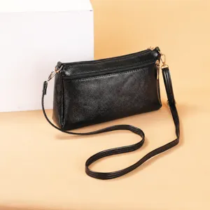 Black PU leather women crossbody shoulder bag stylish casual daily handbag with strap.