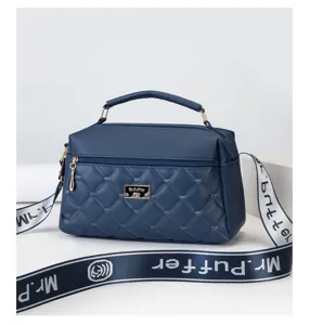 Stylish quilted leather shoulder bag for women, large capacity top-handle commuter handbag.