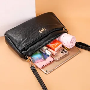 Black PU leather crossbody shoulder bag for women, stylish daily casual handbag with large capacity.