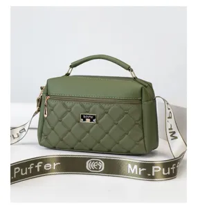 Olive green quilted women crossbody handbag with wide shoulder strap and metal logo accent.