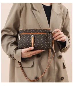 Élégant sac à bandoulière pour femme avec motif monogramme, grande capacité chic et pratique.