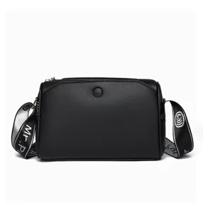 Classic black leather crossbody bag for women with multi-layer zipper and wide strap.