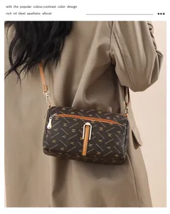 Sac bandoulière élégant pour femme avec imprimé monogramme classique, polyvalent au quotidien.