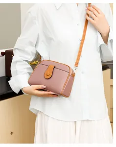Women pink crossbody shoulder bag with brown trim, stylish daily casual PU leather bag.