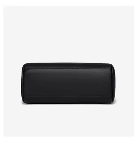 Black leather casual women crossbody bag detail view, premium texture and neat stitching.