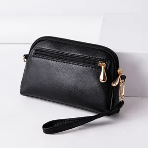 Classic black pu leather mini crossbody bag with wrist strap, compact and stylish everyday use.