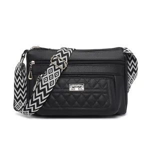 Black quilted crossbody bag for women with wide geometric pattern strap and multi zipper pockets.