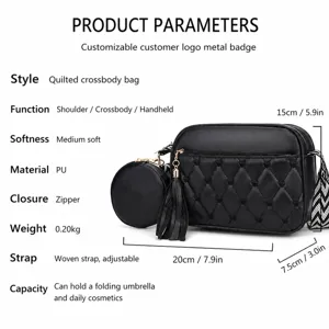 Black quilted shoulder bag with coin pouch, heart embroidery, tassel and wide strap.