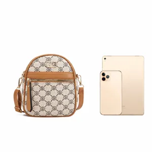 Stylish women monogram crossbody phone bag, compact vertical mini shoulder bag for daily use.