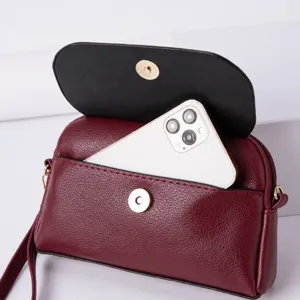 Sac bandoulière pour téléphone en cuir PU pour femme, petit sac bordeaux avec fermeture aimantée.
