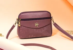 Women's PU leather floral embossed crossbody bag, stylish single shoulder messenger bag with zippers.