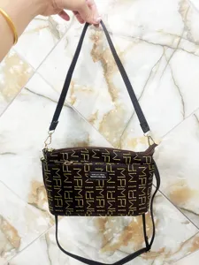 Multi-layer women's crossbody shoulder bag with classic brown monogram pattern and strap.