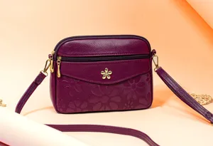 Purple floral embossed women leather crossbody bag, stylish shoulder bag with pockets.
