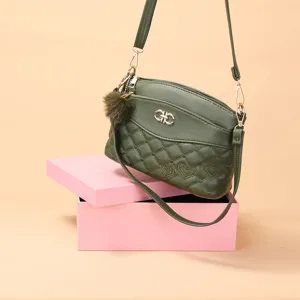 Stylish olive green quilted crossbody bag featuring heart embroidery and a cute fluffy charm.