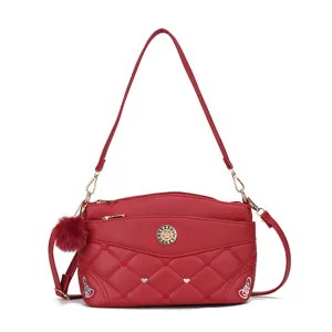 Red leather women shoulder bag quilted crossbody handbag with gold hardware and cute pompom.