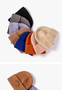 Gorro de punto cálido de invierno para hombre y mujer, elegante gorro liso con vuelta de canalé.