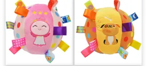 Plush sensory tag ball toy featuring colorful ribbons, cute embroidery, and sound.
