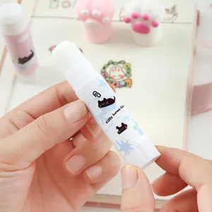 Cute cat pattern solid glue stick detail shot, portable student stationery office supply closeup