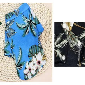 Tropical print pet shirt detail showing vibrant palm leaves, neat stitching, and button closure.