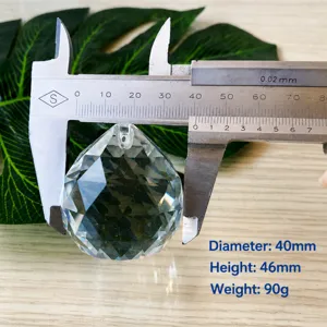 K9 glass crystal chandelier pendant detail shot, multi-faceted hanging crystal ball part.