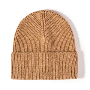 Classic winter ribbed knit beanie hat in camel color, warm and cozy slouchy skull cap.