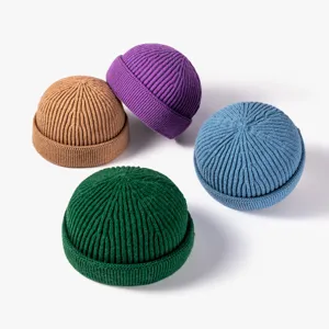 Classic solid color knitted docker cap for men and women, warm winter fashion beanie hat.
