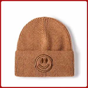Brown knitted hat for autumn and winter featuring a cute embroidered smiley face design.