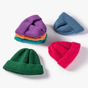 Women's solid color knit beanie winter warm plain wool hat stylish cuff design multi-color options.