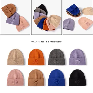 Autumn and winter solid color knit beanie hat with cute embroidered smiley face design