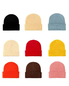 Details of multi-color knitted beanie hats, soft acrylic ribbed texture, warm winter headwear.