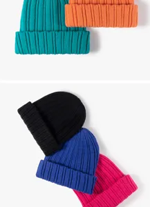 Detailed view of colorful ribbed knit beanies showcasing various vibrant autumn winter colors.