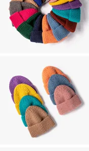 Solid color knit beanie hat for winter, cozy warm casual cuff winter cap details view.