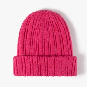 Vibrant magenta ribbed knit beanie hat, soft warm winter skull cap, casual stylish headwear.
