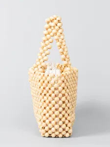 Handmade wooden beaded handbag chic woven bucket bag for women beach vacation style